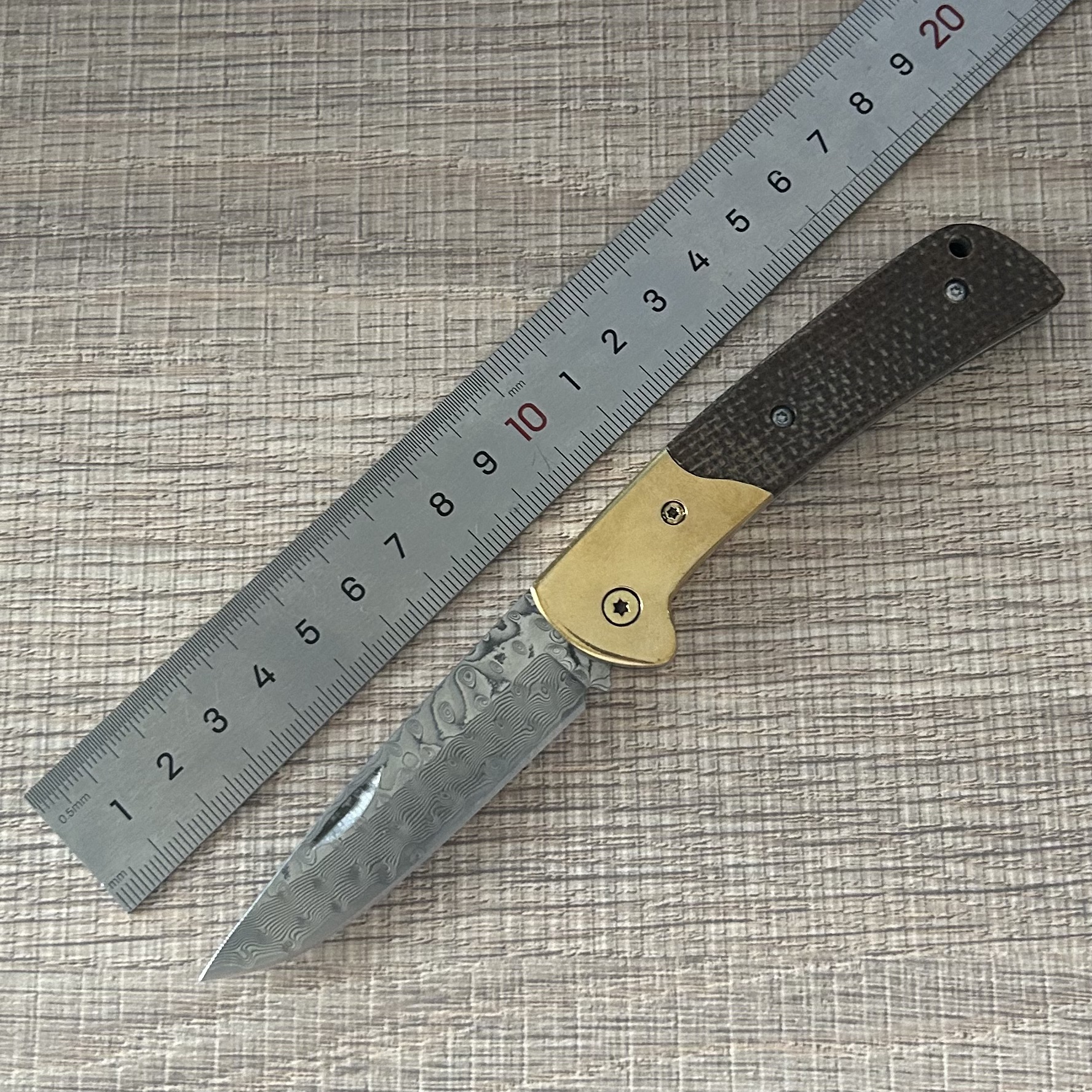 wholesale Damascus EDC Knife – Brass-Trimmed Textured Grip The Sharp Art of Daily Carry